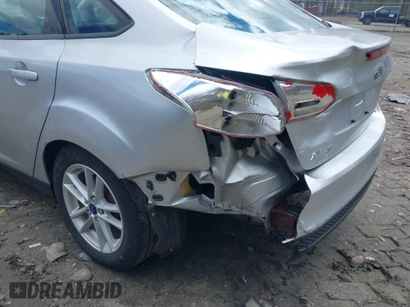 2017 Ford Focus SE with VIN 1FADP3F25HL335102, listed as a IAAI auction lot 42010697 with 77,389 mi miles. Bid and sale history available at carsss.com. Image 6.