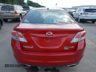 2009 Mazda 6 S Grand Touring with VIN 1YVHP82B895M20692, listed as a IAAI auction lot 42134552 with 264,332 mi miles and . Bid and sale history available at DreamBid. Image 16.