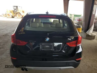 2013 BMW X1 28i z VIN WBAVM1C50DVW43672, wystawiony jako Copart lot #60318395 z przebiegiem 59 636 mil mil oraz Szkoda całkowita • Salvage title. Historia ofert i sprzedaży dostępna na DreamBid. Obrazek 6.