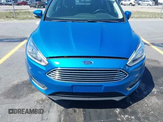 2015 Ford Focus Titanium with VIN 1FADP3J24FL322247, listed as a IAAI auction lot 41998030 with 151,341 mi miles and . Bid and sale history available at carsss.com. Image 6.