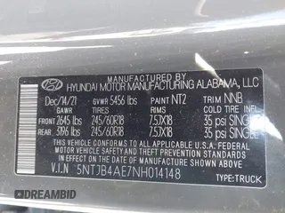 2022 Hyundai Santa Cruz SEL with VIN 5NTJB4AE7NH014148, listed as a IAAI auction lot 41263713 with 70,619 mi miles and . Bid and sale history available at DreamBid. Image 9.