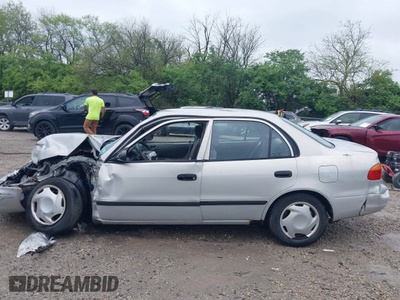 2001 Chevrolet Prizm z VIN 1Y1SK52851Z423703, wystawiony jako IAAI lot #42169702 z przebiegiem Nie podano mil oraz . Historia ofert i sprzedaży dostępna na DreamBid. Obrazek 15.
