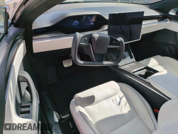 2022 Tesla Model S Plaid z VIN 5YJSA1E64NF461218, wystawiony jako Copart lot #74178794 z przebiegiem Nie podano mil oraz Szkoda całkowita • Salvage title. Historia ofert i sprzedaży dostępna na DreamBid. Obrazek 8.
