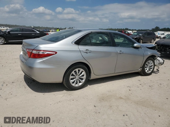 2015 Toyota Camry XLE with VIN 4T1BF1FK4FU874693, listed as a Copart auction lot 53556665 with 214,645 mi miles and Salvage Title. Bid and sale history available at carsss.com. Image 3.