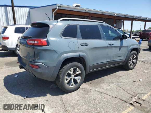 2014 Jeep Cherokee Trailhawk z VIN 1C4PJMBBXEW134939, wystawiony jako Copart lot #56579125 z przebiegiem 155 693 mil mil oraz Czysty tytuł • Clean title. Historia ofert i sprzedaży dostępna na DreamBid. Obrazek 3.