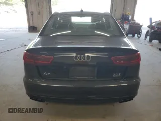 2016 Audi A6 Prestige with VIN WAUHGAFC2GN001442, listed as a Copart auction lot 61633805 with 128,140 mi miles and Salvage title. Bid and sale history available at DreamBid. Image 6.