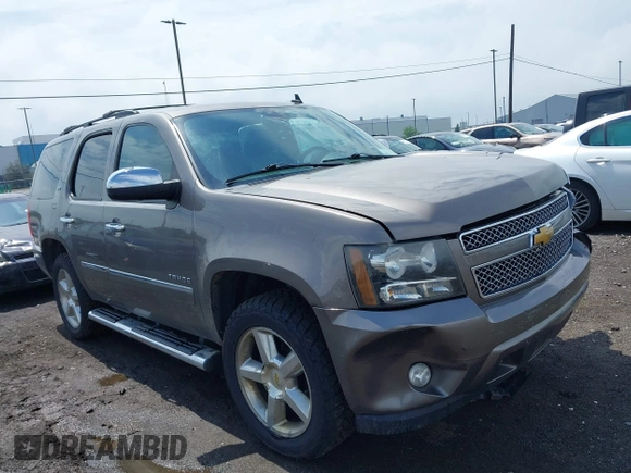 2013 Chevrolet Tahoe LTZ with VIN 1GNSKCE0XDR373858, listed as a IAAI auction lot 42456875 with 297,084 mi miles and . Bid and sale history available at DreamBid. Image 1.