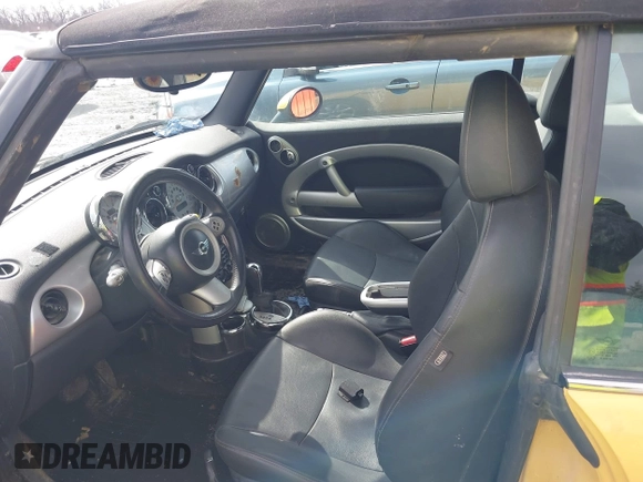 2007 MINI Convertible with VIN WMWRF33507TG16661, listed as a IAAI auction lot 41674275 with 133,838 mi miles and . Bid and sale history available at DreamBid. Image 5.