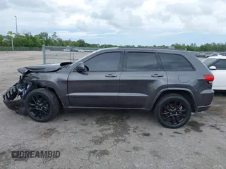 2018 Jeep Grand Cherokee Altitude z VIN 1C4RJEAG2JC428214, wystawiony jako IAAI lot #42661661 z przebiegiem 81 859 mil mil oraz . Historia ofert i sprzedaży dostępna na DreamBid. Obrazek 15.