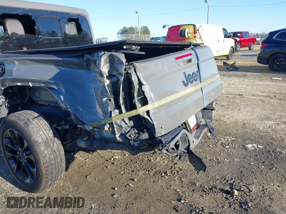 2022 Jeep Gladiator High Altitude with VIN 1C6HJTFGXNL124571, listed as a IAAI auction lot 41272140 with 14,198 mi miles and . Bid and sale history available at DreamBid. Image 6.