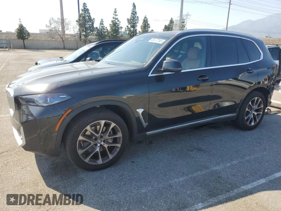 2025 BMW X5 sDrive40i with VIN 5UX13EU05S9W82678, listed as a Copart auction lot 49857255 with 9,901 mi miles and Salvage Title. Bid and sale history available at carsss.com. Image 1.