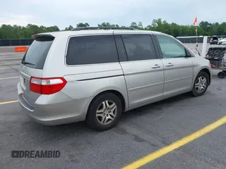 2007 Honda Odyssey EX-L z VIN 5FNRL38647B426620, wystawiony jako IAAI lot #42059093 z przebiegiem 258 622 mil mil oraz . Historia ofert i sprzedaży dostępna na DreamBid. Obrazek 4.