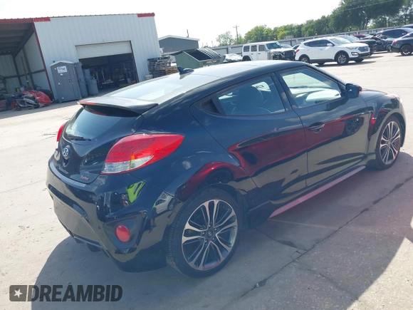 2016 Hyundai Veloster Turbo z VIN KMHTC6AE7GU255020, wystawiony jako IAAI lot #42720287 z przebiegiem 89 629 mil mil oraz . Historia ofert i sprzedaży dostępna na DreamBid. Obrazek 4.