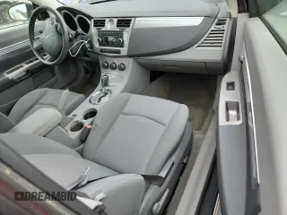 2008 Chrysler Sebring Touring z VIN 1C3LC55RX8N135160, wystawiony jako Copart lot #59419975 z przebiegiem 98 155 mil mil oraz Czysty tytuł • Clean title. Historia ofert i sprzedaży dostępna na DreamBid. Obrazek 8.