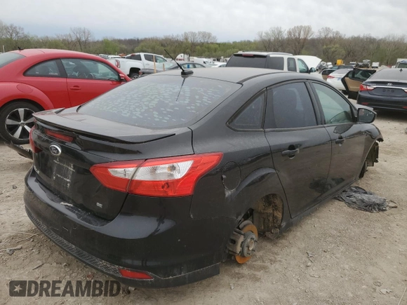 2012 Ford Focus SE with VIN 1FAHP3F27CL400610, listed as a Copart auction lot 51669765 with Not Provided miles and Salvage Title. Bid and sale history available at DreamBid. Image 3.