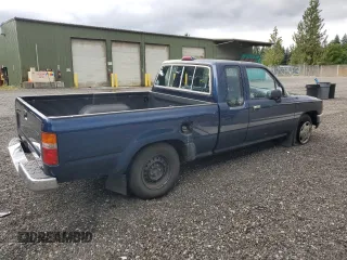 1994 Toyota Pickup DX with VIN JT4RN93P9R5106937, listed as a Copart auction lot 63055765 with 128,039 mi miles and Clean title. Bid and sale history available at DreamBid. Image 3.