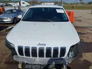 2019 Jeep Cherokee Limited with VIN 1C4PJLDBXKD487843, listed as a IAAI auction lot 41979449 with 104,545 mi miles. Bid and sale history available at carsss.com. Image 13.