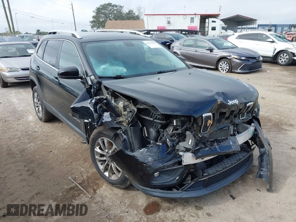 2019 Jeep Cherokee Latitude Plus with VIN 1C4PJLLN4KD119783, listed as a IAAI auction lot 41223282 with 84,917 mi miles. Bid and sale history available at carsss.com. Image 1.