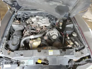2003 Ford Mustang Standard z VIN 1FAFP404X3F342630, wystawiony jako Copart lot #66846924 z przebiegiem 191 297 mil mil oraz Szkoda całkowita • Salvage title. Historia ofert i sprzedaży dostępna na DreamBid. Obrazek 11.