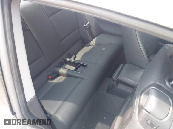 2009 BMW 1 Series 128i z VIN WBAUP73549VK75378, wystawiony jako IAAI lot #41872843 z przebiegiem 77 985 mil mil oraz . Historia ofert i sprzedaży dostępna na DreamBid. Obrazek 8.