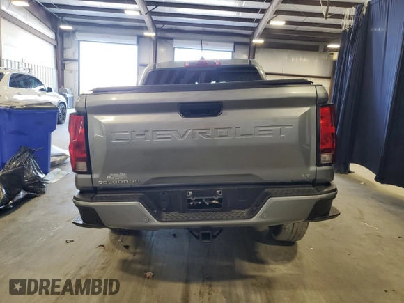 2023 Chevrolet Colorado 4WD LT z VIN 1GCPTCEK2P1208273, wystawiony jako Copart lot #45269295 z przebiegiem 19 113 mil mil oraz Szkoda całkowita • Salvage title. Historia ofert i sprzedaży dostępna na DreamBid. Obrazek 6.