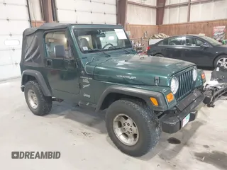 2000 Jeep Wrangler Sport with VIN 1J4FA49S2YP712526, listed as a IAAI auction lot 42151725 with 99,416 mi miles. Bid and sale history available at carsss.com. Image 1.