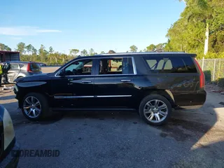 2015 Cadillac Escalade ESV Premium z VIN 1GYS4JKJXFR291842, wystawiony jako IAAI lot #41235490 z przebiegiem 115 037 mil mil oraz . Historia ofert i sprzedaży dostępna na DreamBid. Obrazek 15.
