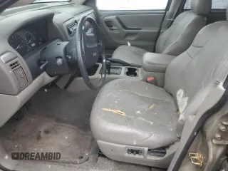 2004 Jeep Grand Cherokee Laredo with VIN 1J4GW48N94C408435, listed as a Copart auction lot 53101955 with Not provided miles and Clean title. Bid and sale history available at DreamBid. Image 7.