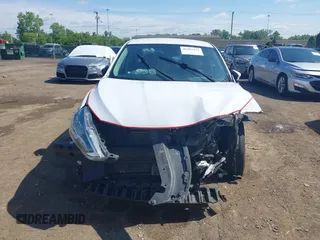 2019 Nissan Sentra S z VIN 3N1AB7AP6KY413233, wystawiony jako IAAI lot #42281572 z przebiegiem 111 297 mil mil oraz . Historia ofert i sprzedaży dostępna na DreamBid. Obrazek 13.