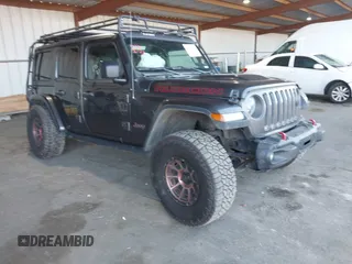 2018 Jeep Wrangler Unlimited Rubicon с VIN 1C4HJXFN1JW185914, выставлен на аукционе IAAI как лот 41360730 с пробегом 152 777 миль миль и . История ставок и продаж доступна на DreamBid. Изображение 1.