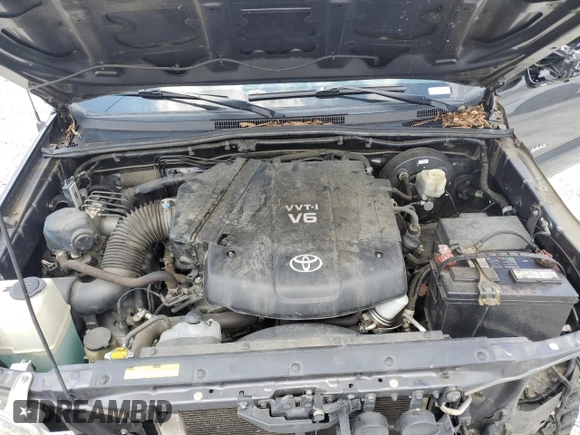 2015 Toyota Tacoma with VIN 3TMMU4FN1FM073755, listed as a Copart auction lot 59657105 with 114,193 mi miles and Salvage title. Bid and sale history available at DreamBid. Image 11.