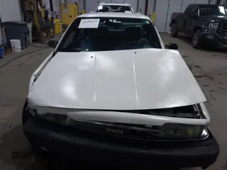 1990 Toyota Camry z VIN JT2SV21E5L3398379, wystawiony jako IAAI lot #41699413 z przebiegiem 100 136 mil mil oraz . Historia ofert i sprzedaży dostępna na DreamBid. Obrazek 11.