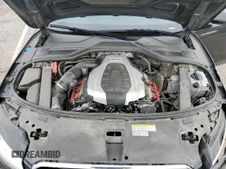 2018 Audi A8 z VIN WAU44AFD9JN000151, wystawiony jako Copart lot #44697923 z przebiegiem 91 402 mil mil oraz . Historia ofert i sprzedaży dostępna na DreamBid. Obrazek 12.