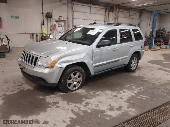 2009 Jeep Grand Cherokee Laredo with VIN 1J8GR48K89C553694, listed as a IAAI auction lot 41984820 with 196,266 mi miles. Bid and sale history available at carsss.com. Image 2.