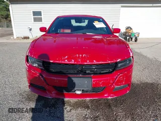 2015 Dodge Charger SXT with VIN 2C3CDXHGXFH858399, listed as a IAAI auction lot 42090958 with 71,488 mi miles and . Bid and sale history available at DreamBid. Image 12.