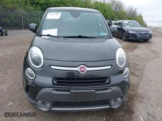 2014 FIAT 500L Trekking with VIN ZFBCFADHXEZ011031, listed as a IAAI auction lot 42094509 with 74,132 mi miles. Bid and sale history available at carsss.com. Image 6.
