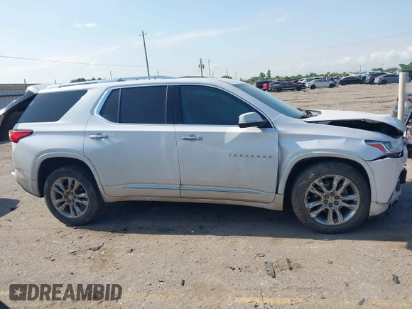 2020 Chevrolet Traverse High Country with VIN 1GNEVNKWXLJ135322, listed as a IAAI auction lot 42042466 with 105,748 mi miles and . Bid and sale history available at DreamBid. Image 13.