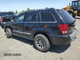 2005 Jeep Grand Cherokee Limited with VIN 1J8HR58265C699077, listed as a Copart auction lot 58490185 with 163,280 mi miles and Salvage title. Bid and sale history available at DreamBid. Image 2.