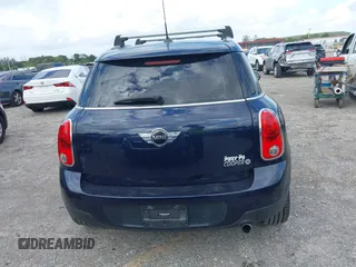 2013 MINI Countryman with VIN WMWZB3C58DWM07817, listed as a IAAI auction lot 41962291 with 60,763 mi miles and . Bid and sale history available at DreamBid. Image 17.