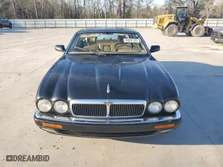 1997 Jaguar XJ with VIN SAJHX1245VC805665, listed as a Copart auction lot 45024125 with 0 mi miles and Salvage Title. Bid and sale history available at carsss.com. Image 5.