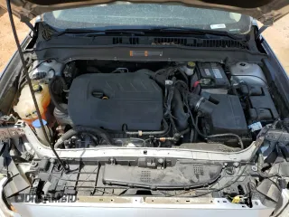 2018 Ford Fusion SE z VIN 3FA6P0HD3JR238137, wystawiony jako Copart lot #54828205 z przebiegiem 131 221 mil mil oraz Szkoda całkowita • Salvage title. Historia ofert i sprzedaży dostępna na DreamBid. Obrazek 11.
