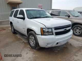 2010 Chevrolet Tahoe LS with VIN 1GNMCAE3XAR215407, listed as a IAAI auction lot 41570899 with 197,401 mi miles and . Bid and sale history available at DreamBid. Image 1.