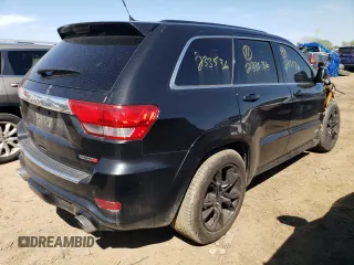 2012 Jeep Grand Cherokee SRT8 with VIN 1C4RJFDJ2CC352056, listed as a Copart auction lot 48810994 with 114,807 mi miles and Salvage Title. Bid and sale history available at carsss.com. Image 3.