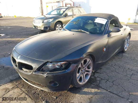 2004 BMW Z4 2.5i with VIN 4USBT33544LS51157, listed as a IAAI auction lot 41343067 with NaN miles. Bid and sale history available at carsss.com. Image 6.