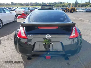2013 Nissan 370Z with VIN JN1AZ4EH1DM880739, listed as a IAAI auction lot 40474120 with 76,369 mi miles. Bid and sale history available at carsss.com. Image 16.