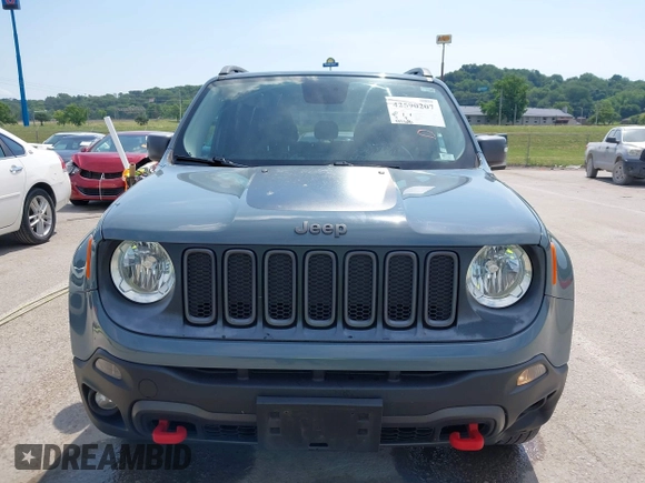 2015 Jeep Renegade Trailhawk with VIN ZACCJBCT8FPB33586, listed as a IAAI auction lot 42590207 with 127,168 mi miles and . Bid and sale history available at DreamBid. Image 12.