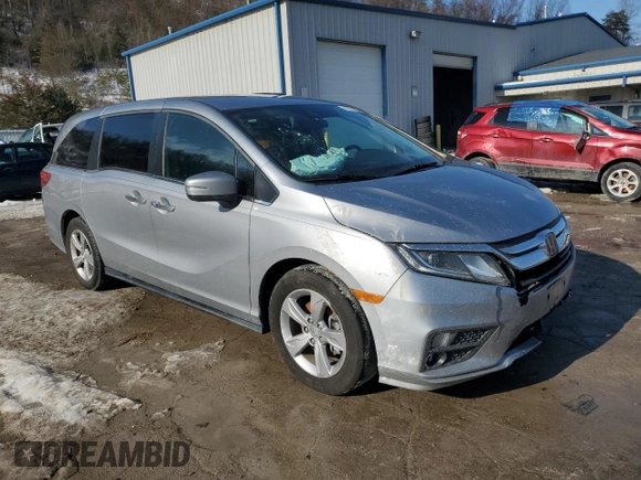 2019 Honda Odyssey EX with VIN 5FNRL6H59KB074264, listed as a Copart auction lot 87653495 with 104,422 mi miles and Salvage Title. Bid and sale history available at carsss.com. Image 4.