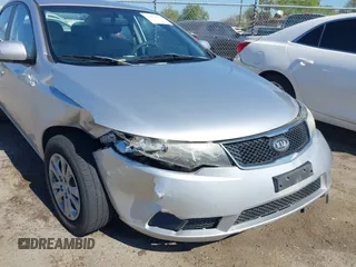 2010 Kia Forte EX with VIN KNAFU4A2XA5097831, listed as a IAAI auction lot 41872156 with 168,081 mi miles. Bid and sale history available at carsss.com. Image 6.