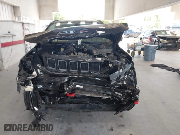 2020 Jeep Compass Trailhawk with VIN 3C4NJDDB3LT170463, listed as a IAAI auction lot 42446080 with 83,336 mi miles and . Bid and sale history available at DreamBid. Image 13.