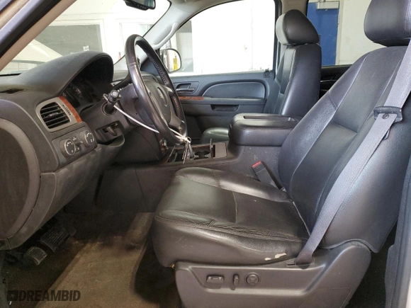 2012 Chevrolet Suburban LTZ with VIN 1GNSKKE74CR325522, listed as a Copart auction lot 52215745 with 214,973 mi miles and Clean Title. Bid and sale history available at carsss.com. Image 7.
